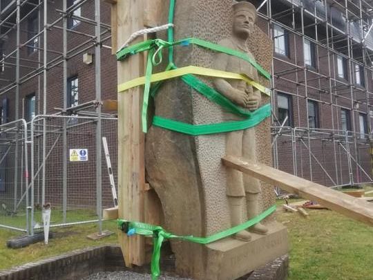 A structural crate to the profile of the Submariners Statue