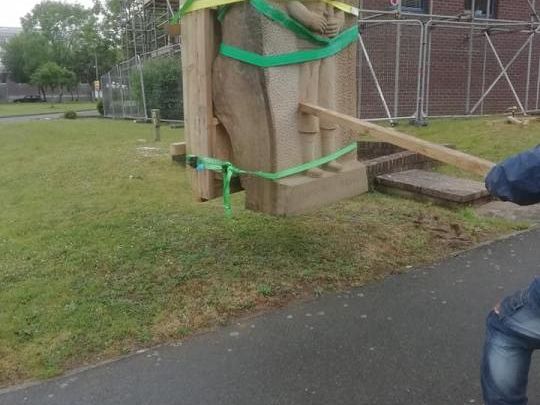 A structural crate to the profile of the Submariners Statue