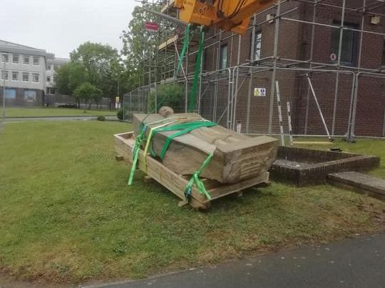 A structural crate to the profile of the Submariners Statue